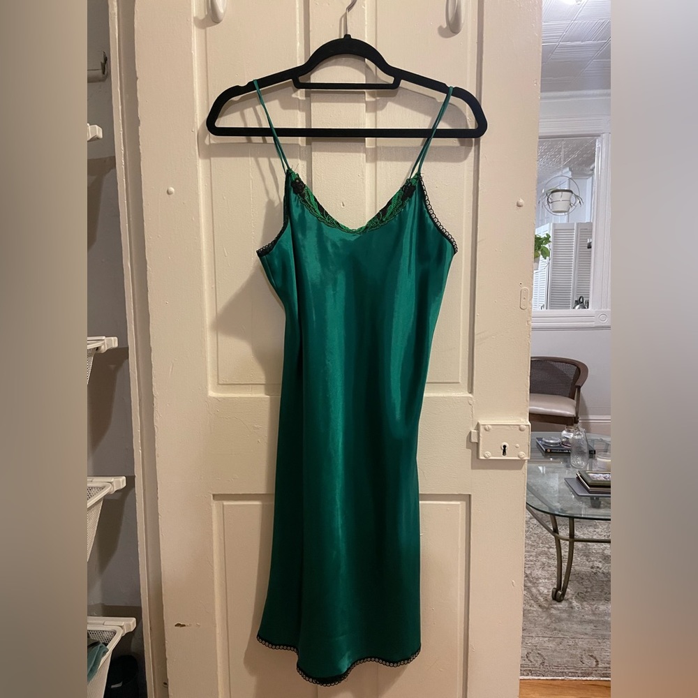 Green satin slip dress with embroidered detail